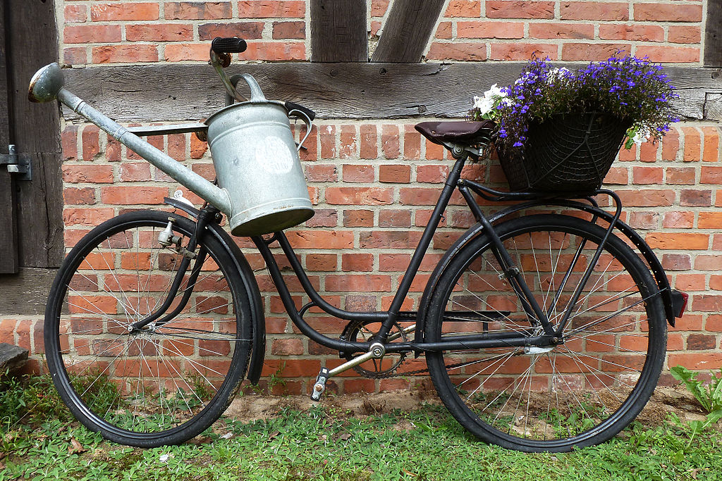 1024px-Bicycle_and_watering_can